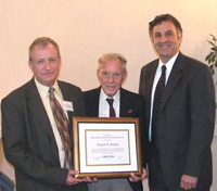 Eugene Saloga receives the CNY RPDB's 2006 Rhea Eckel Clark Citizenship Award at it's 2006 Annual Meeting